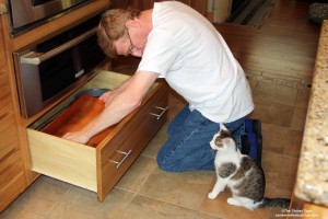 Paul and Annie cleaning drawers