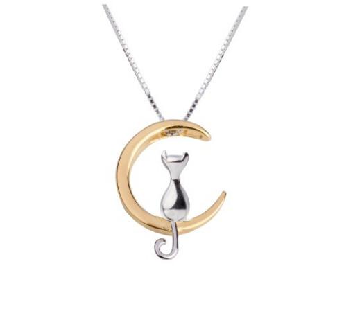 Triple T Studios Cat Sitting on Crescent Moon